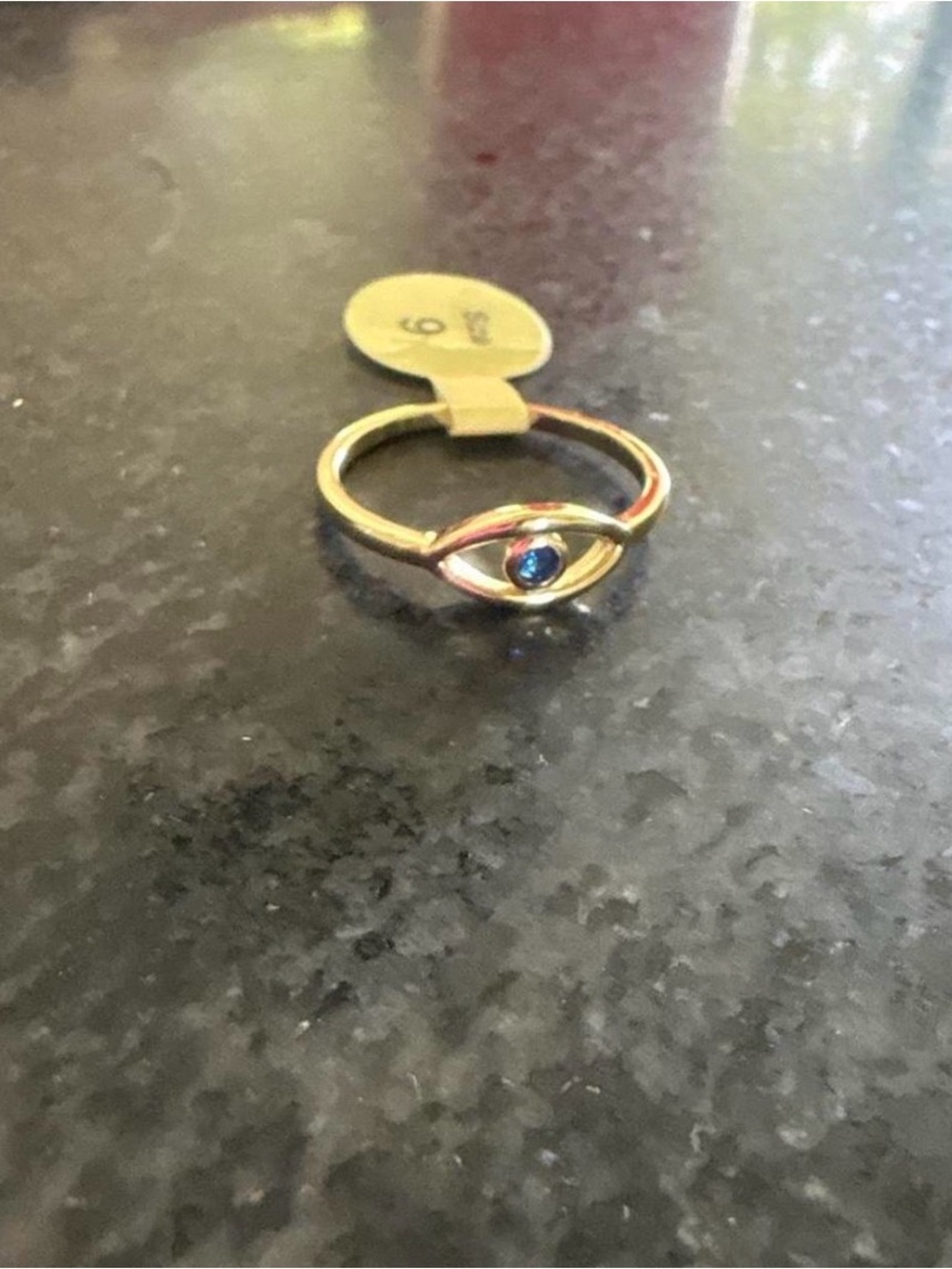 Gold Evil Eye Ring with Blue Stone Accent